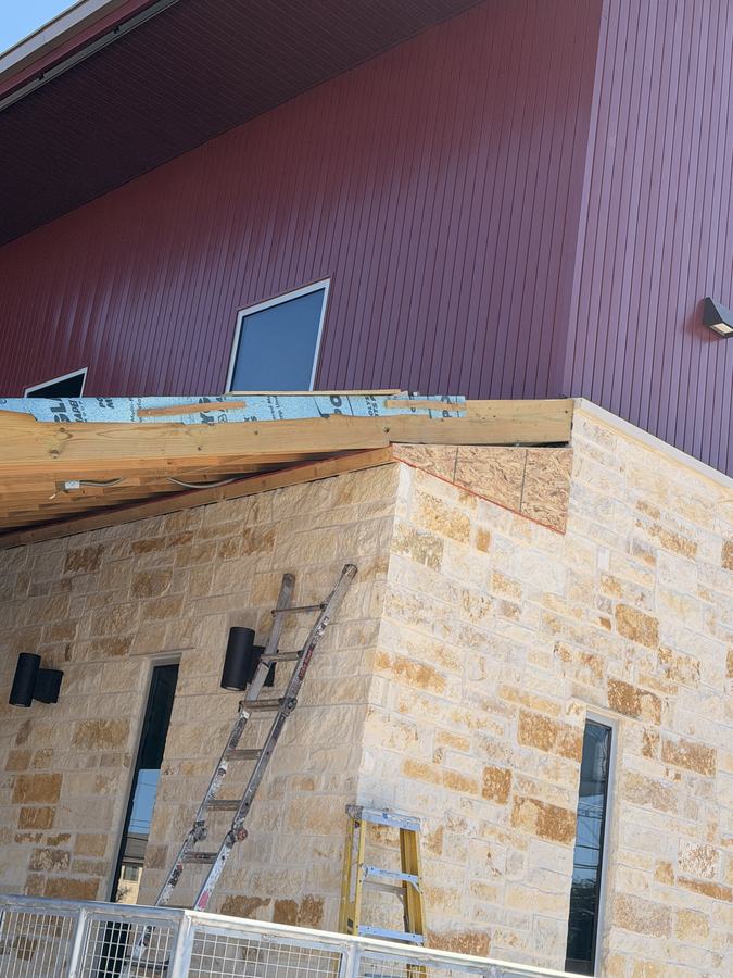 Metal Siding and Stone Corner