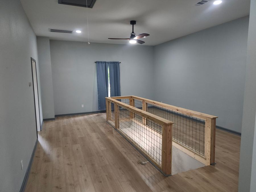 Living Room and Wood-Wire Railing